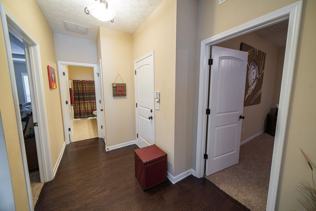 9570 Yarbrough Road Midland, GA 31820 - Photo 23 of 30 a view of a hallway with wooden floor and closet