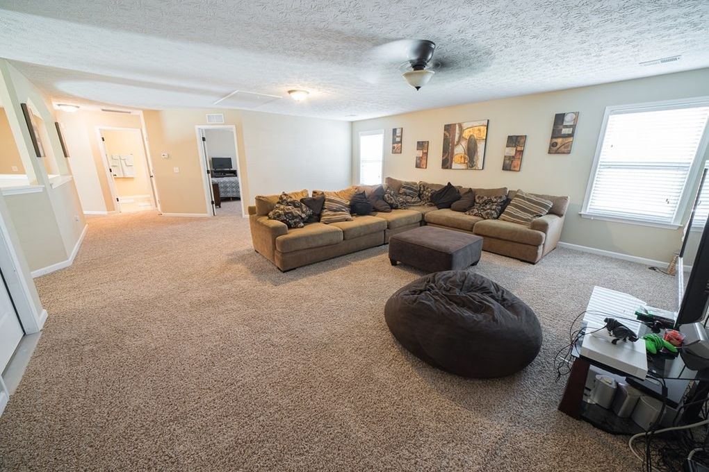 9570 Yarbrough Road Midland, GA 31820 - Photo 25 of 30 a living room with furniture and a window