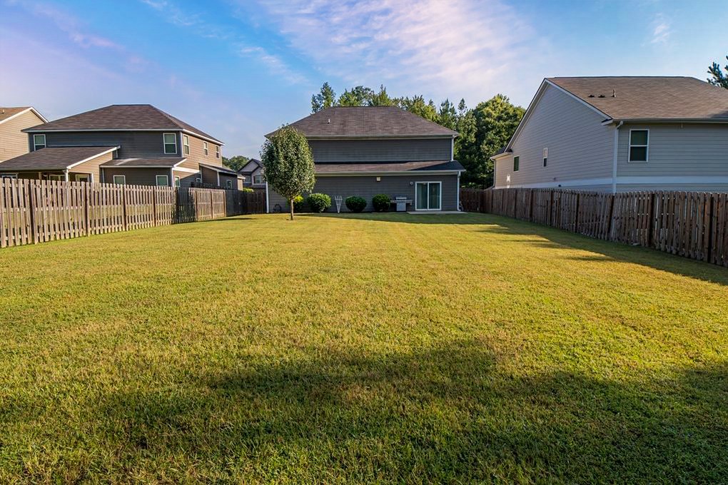 9570 Yarbrough Road Midland, GA 31820 - Photo 29 of 30 a view of a house with a yard