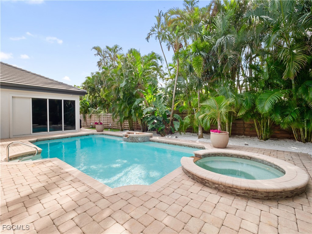 11451 Compass Point Drive Fort Myers, FL 33908 - Photo 38 of 47 a view of a backyard with swimming pool