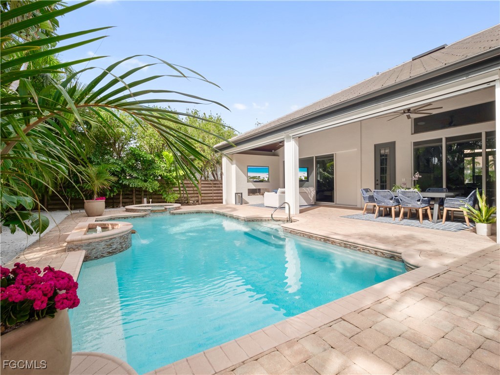 11451 Compass Point Drive Fort Myers, FL 33908 - Photo 4 of 47 a view of a house with swimming pool
