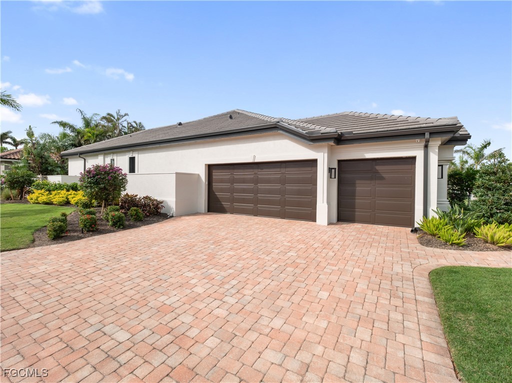 11451 Compass Point Drive Fort Myers, FL 33908 - Photo 45 of 47 a house with yard and a outdoor space