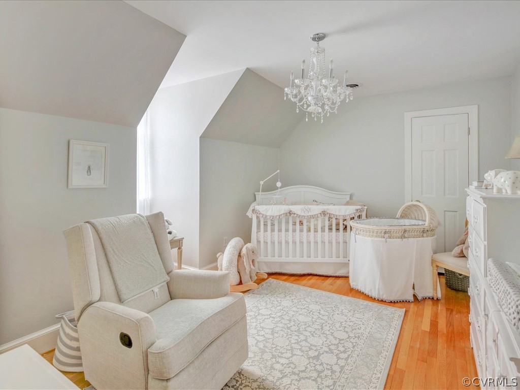 2100 Ramsgate Square Chesterfield, VA 23236 - Photo 27 of 36 a living room with furniture and a chandelier