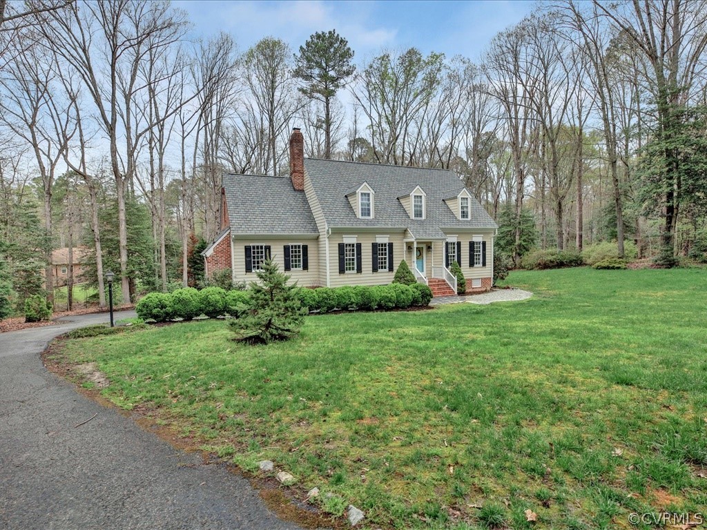 2100 Ramsgate Square Chesterfield, VA 23236 - Photo 4 of 36 a front view of a house with yard and green space