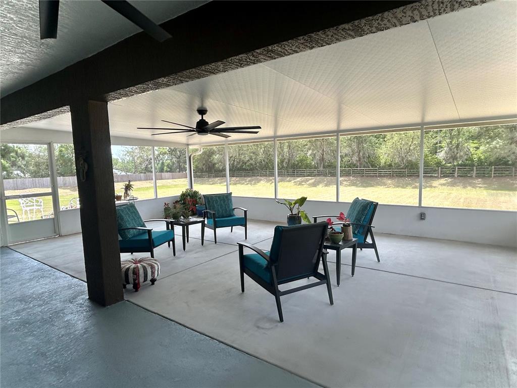 25 Northwest 45th Loop Ocala, FL 34475 - Photo 48 of 61 a view of a dining room with furniture window and outside view