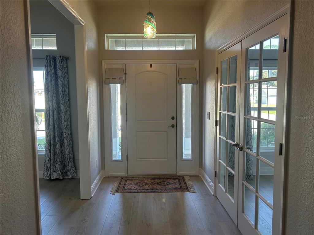 25 Northwest 45th Loop Ocala, FL 34475 - Photo 8 of 61 a view of entryway with livingroom