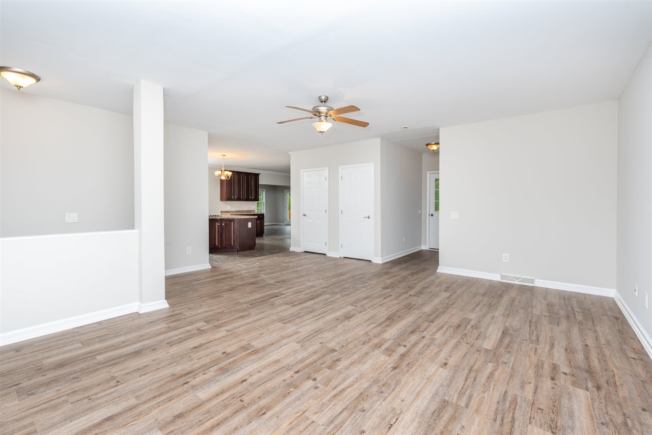 561 Rife's Ford Road Verona, VA 24482 - Photo 16 of 50 wooden floor in an empty room with a window