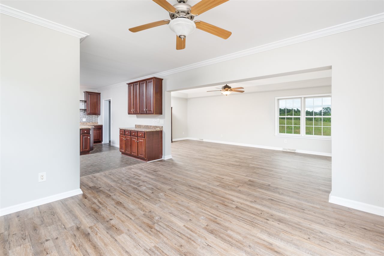 561 Rife's Ford Road Verona, VA 24482 - Photo 18 of 50 wooden floor in an empty room with a window