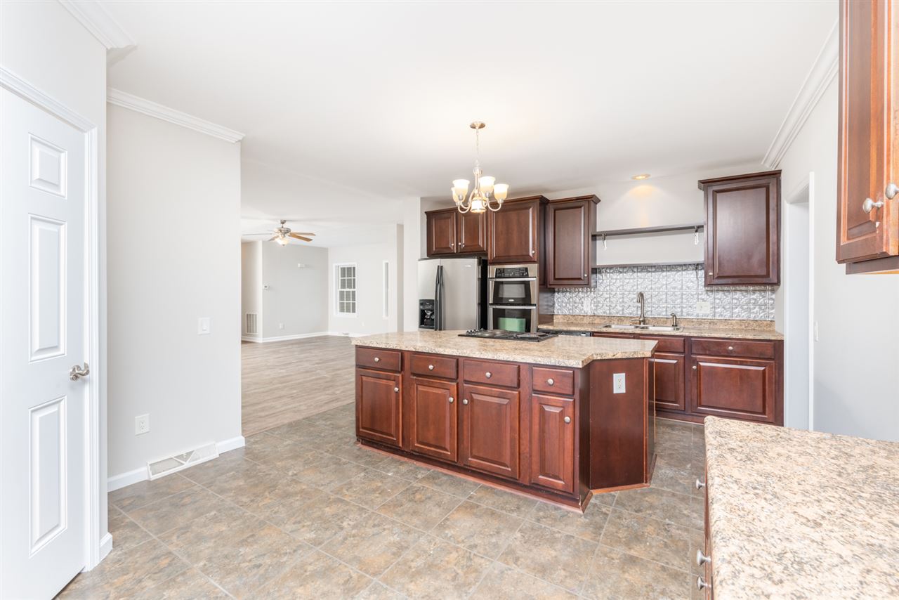 561 Rife's Ford Road Verona, VA 24482 - Photo 24 of 50 a large kitchen with stainless steel appliances granite countertop a refrigerator and a sink
