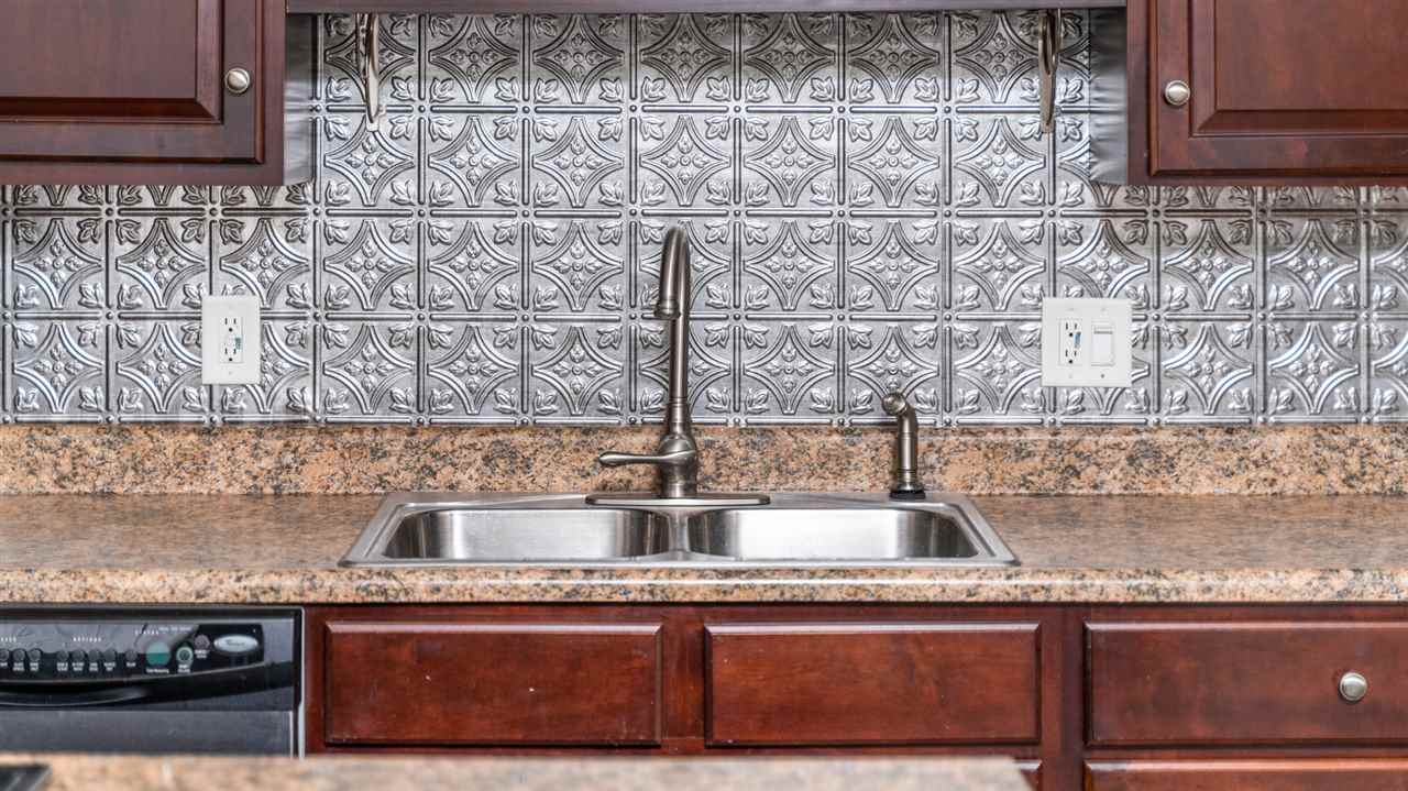 561 Rife's Ford Road Verona, VA 24482 - Photo 28 of 50 a kitchen with granite countertop a sink and a stove