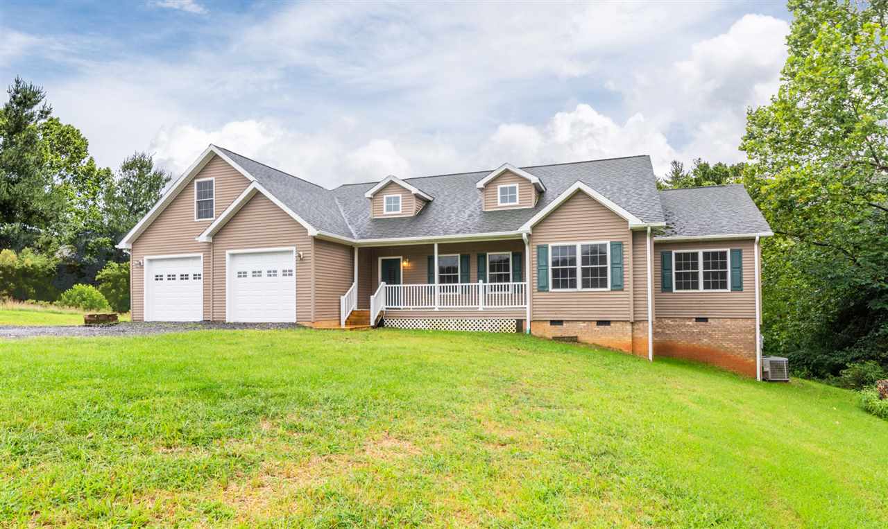561 Rife's Ford Road Verona, VA 24482 - Photo 3 of 50 a front view of a house with a yard and garage