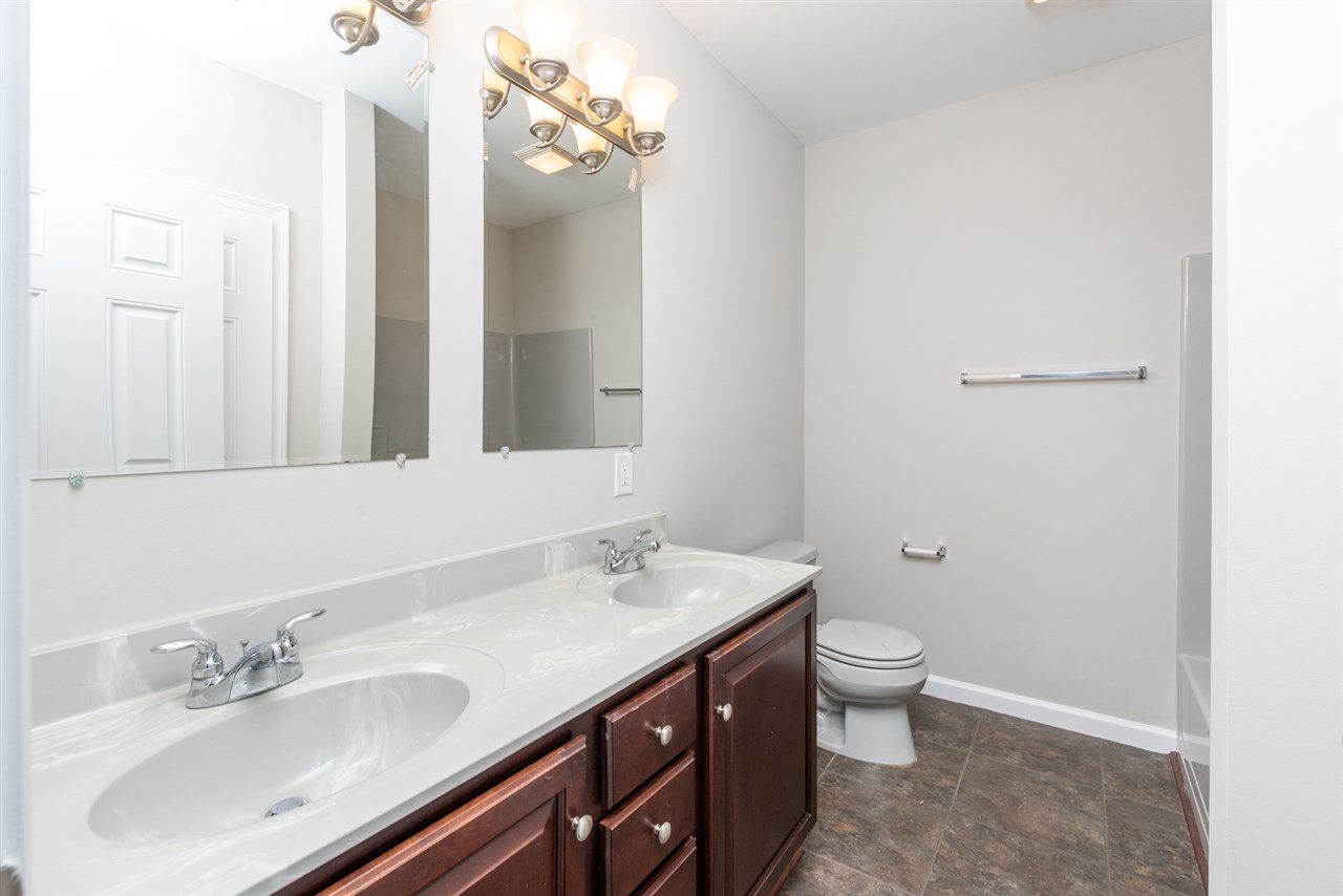 561 Rife's Ford Road Verona, VA 24482 - Photo 34 of 50 a bathroom with a sink and a mirror