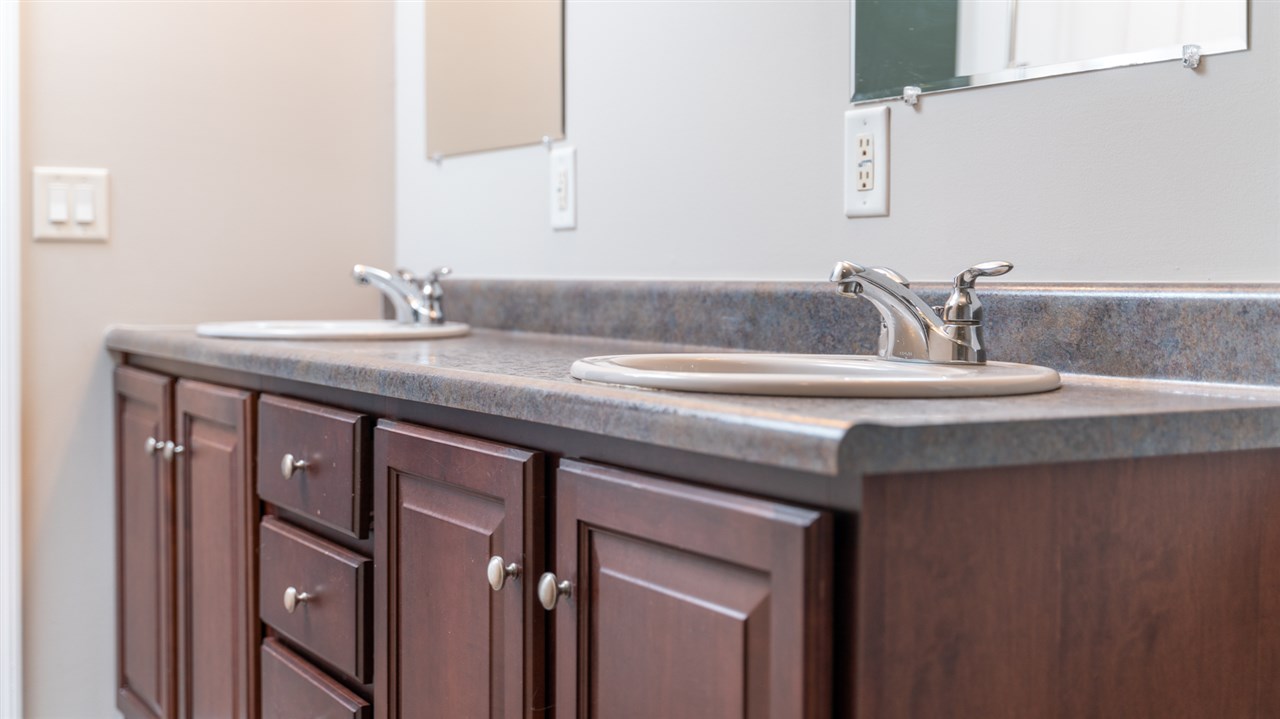 561 Rife's Ford Road Verona, VA 24482 - Photo 36 of 50 a bathroom with a sink and a mirror