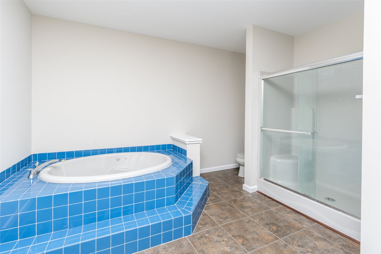 561 Rife's Ford Road Verona, VA 24482 - Photo 37 of 50 a bathroom with a bathtub and a shower