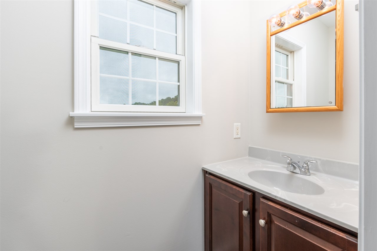 561 Rife's Ford Road Verona, VA 24482 - Photo 45 of 50 a bathroom with a sink and a mirror