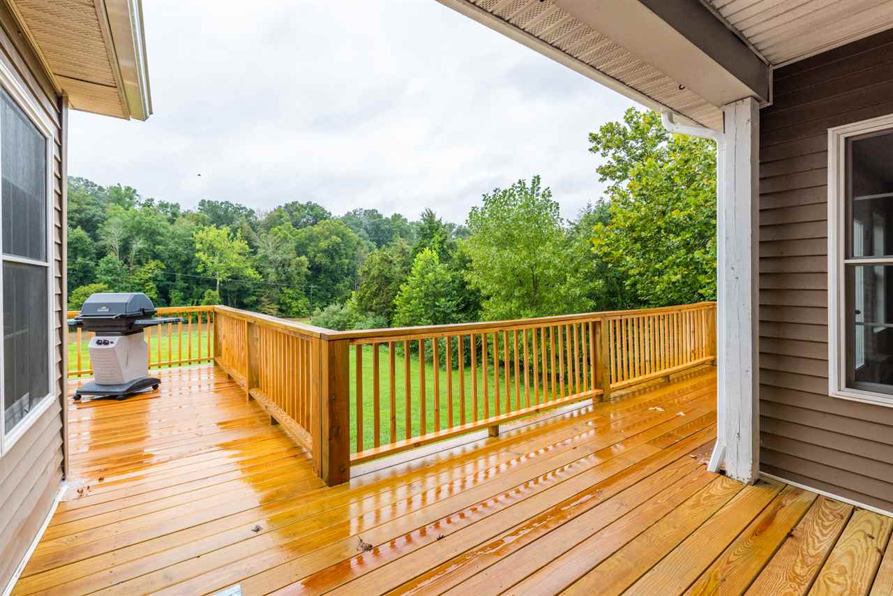 561 Rife's Ford Road Verona, VA 24482 - Photo 9 of 50 a view of balcony with wooden floor and fence