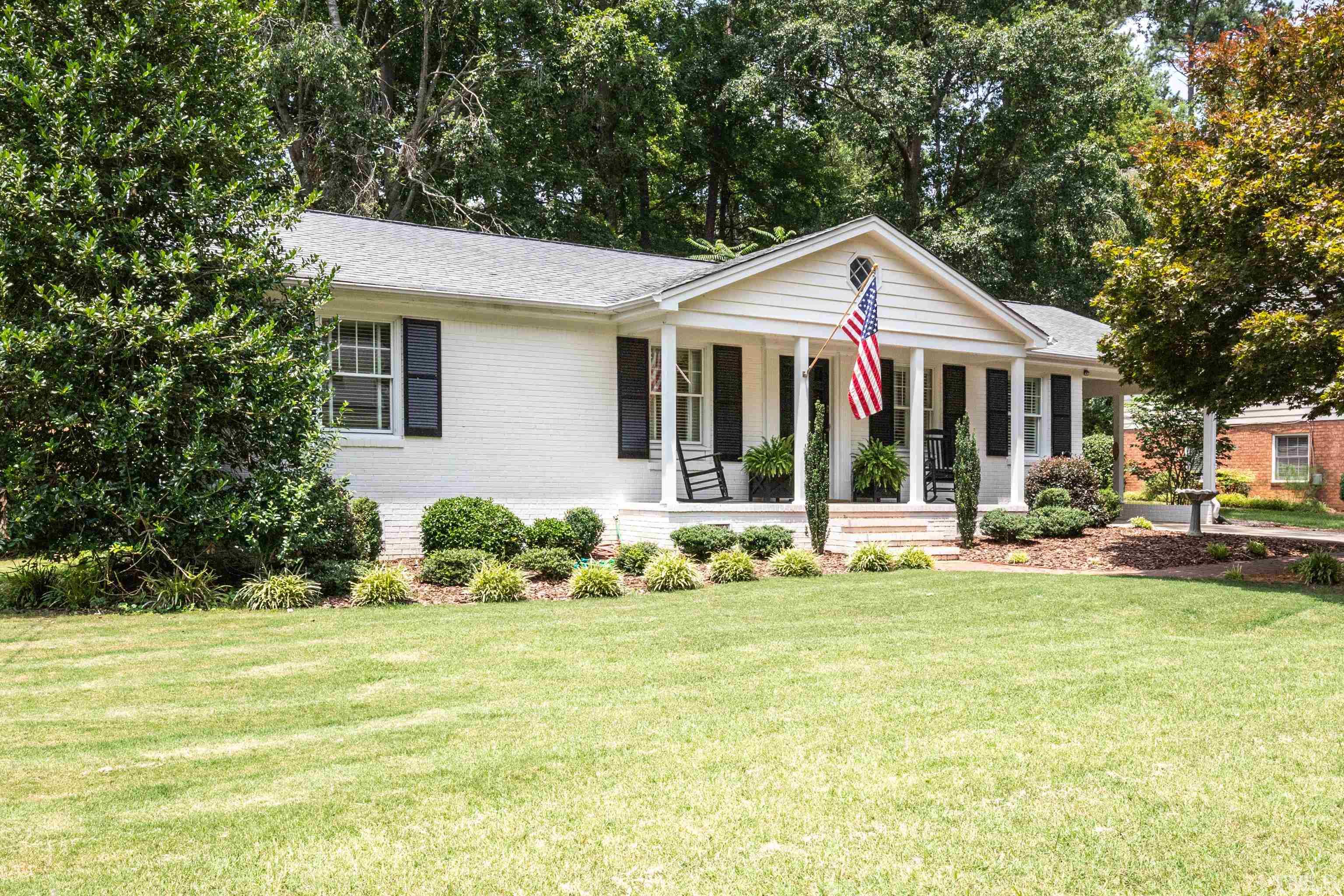 816 Davidson Street Raleigh, NC 27609 - Photo 1 of 36 a view of a house with swimming pool and porch with furniture