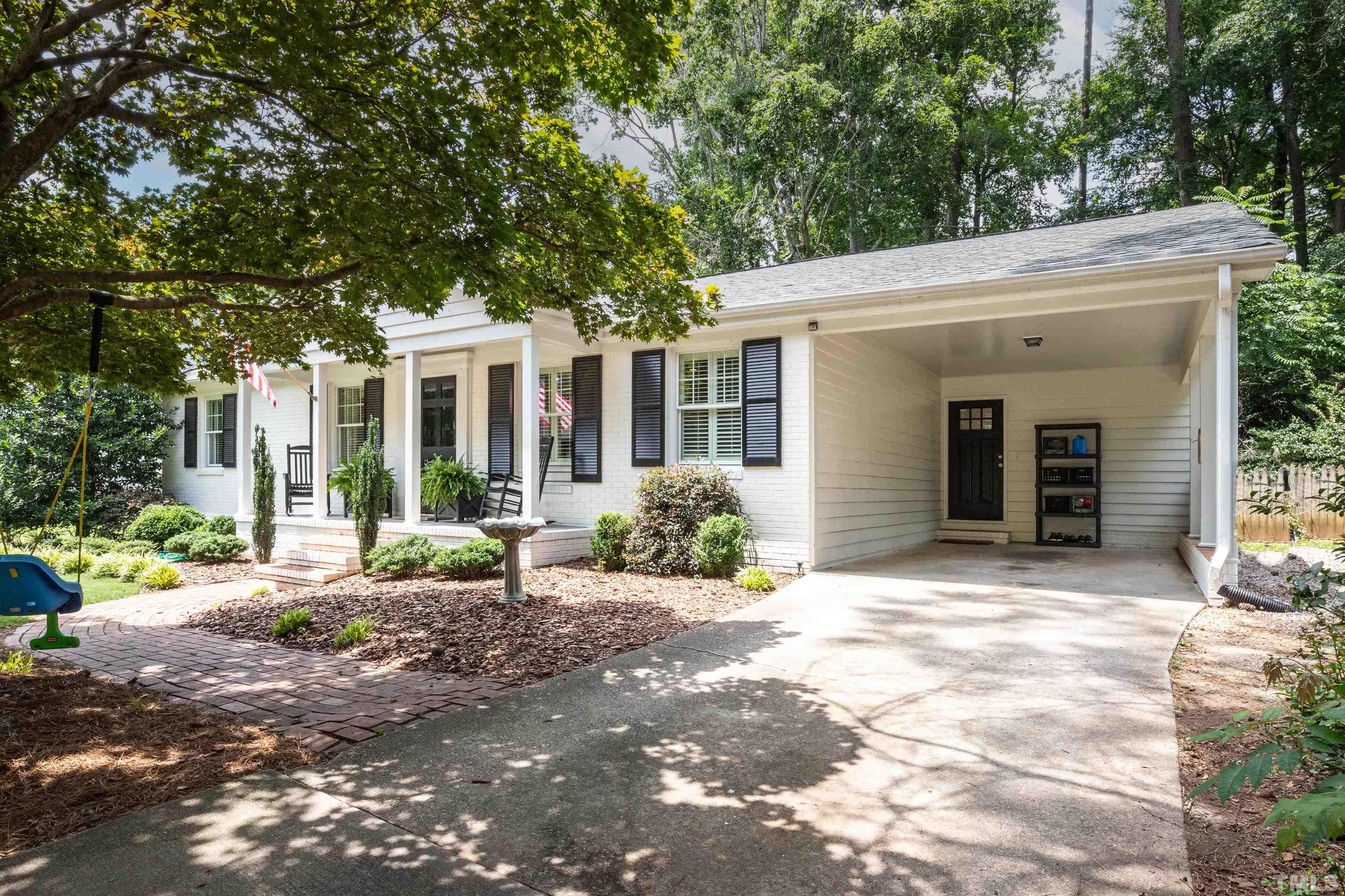 816 Davidson Street Raleigh, NC 27609 - Photo 3 of 36 a view of a house with backyard and porch