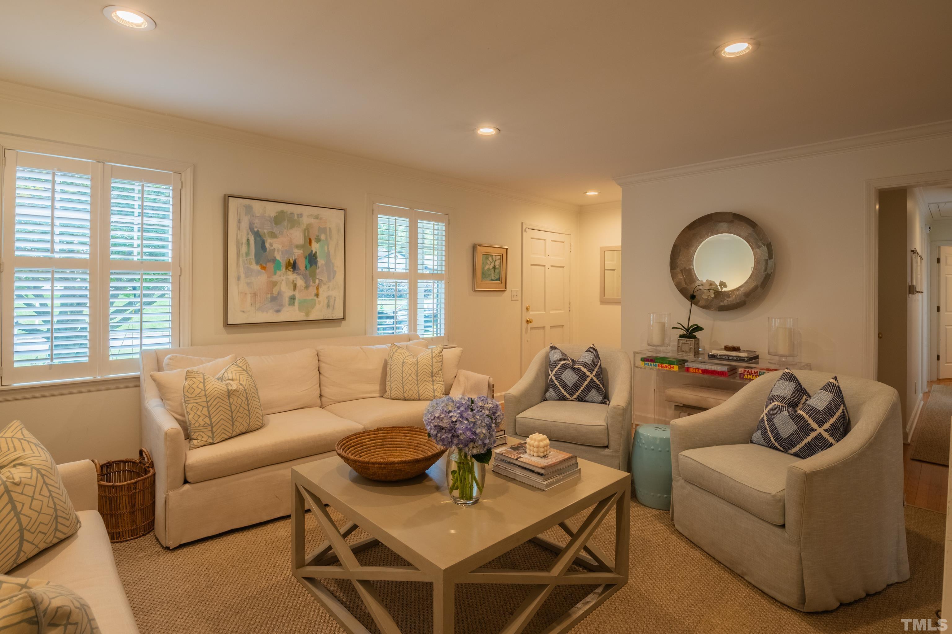816 Davidson Street Raleigh, NC 27609 - Photo 7 of 36 a living room with furniture and a large window