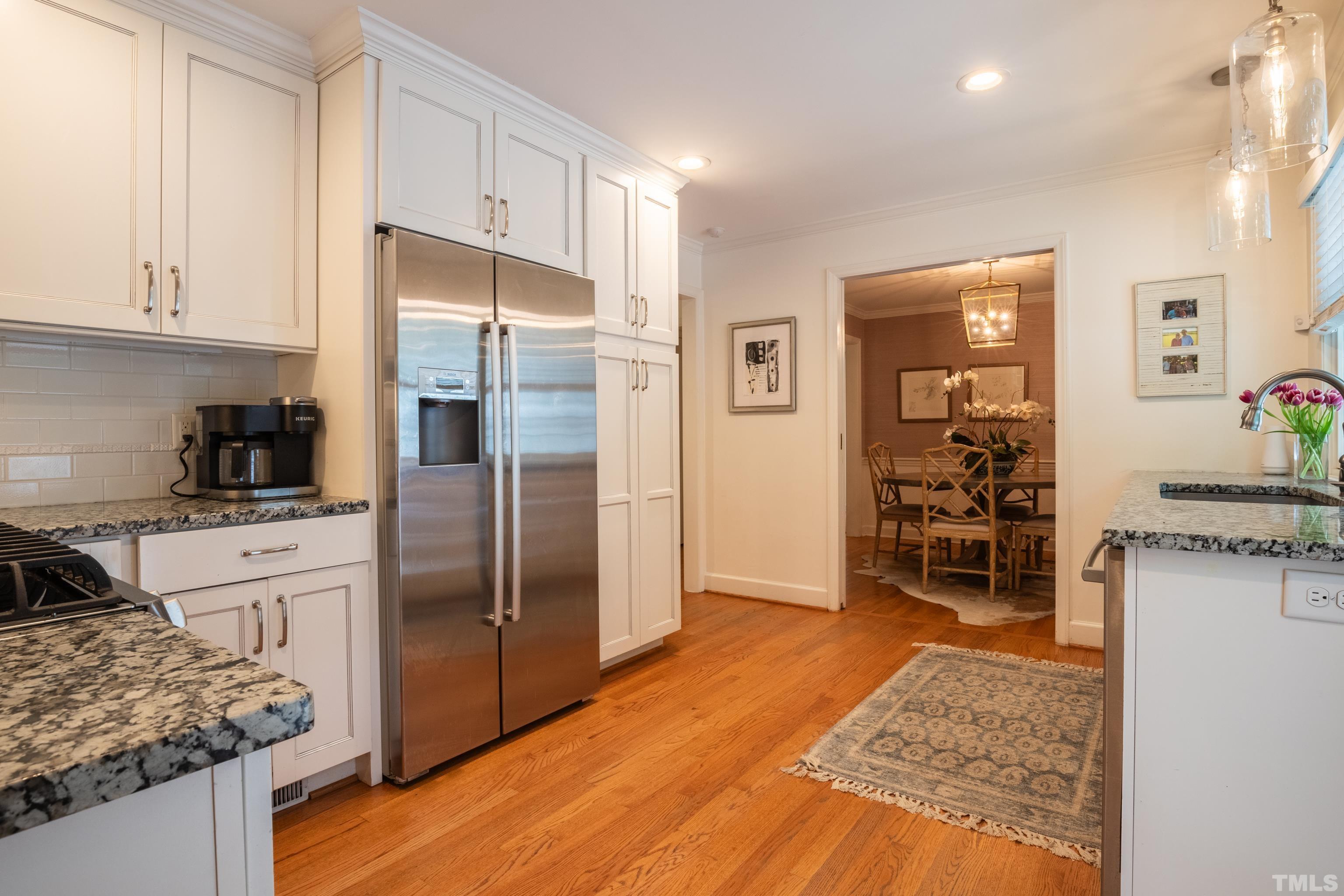 816 Davidson Street Raleigh, NC 27609 - Photo 9 of 36 a kitchen with stainless steel appliances granite countertop a refrigerator oven stove a sink and dishwasher