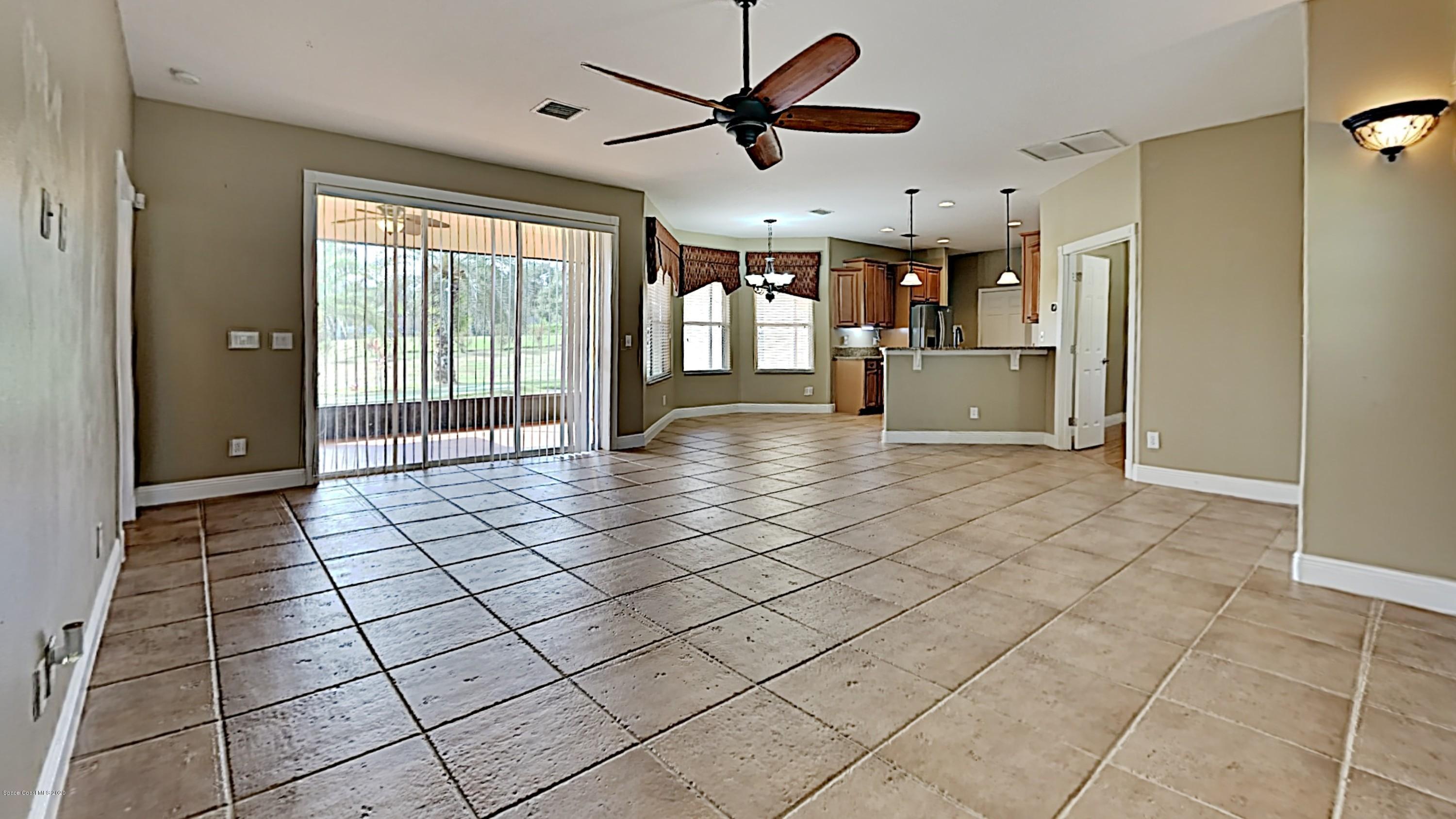 830 Riviera Drive Northeast Palm Bay, FL 32905 - Photo 2 of 21 a view of livingroom with furniture