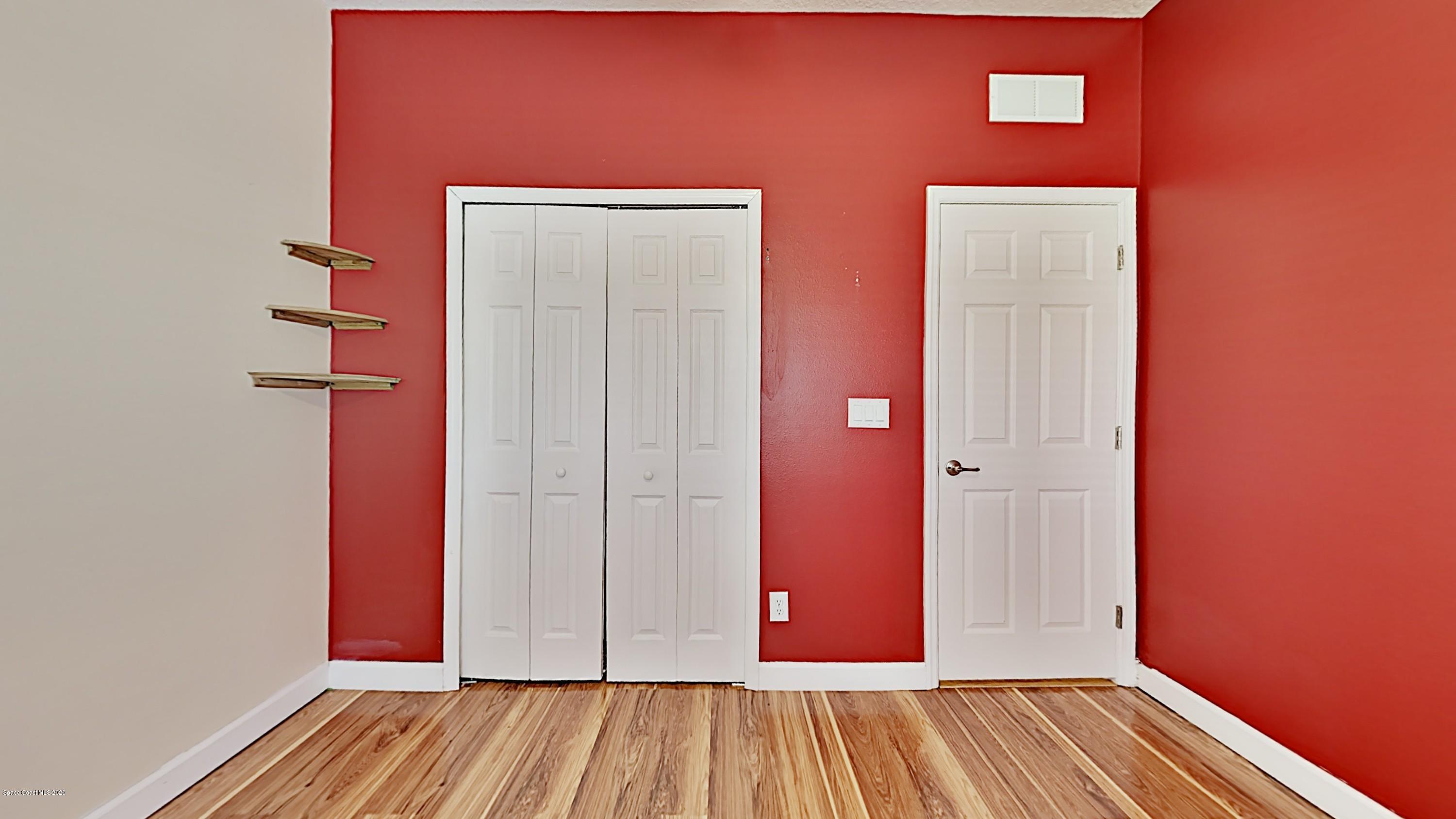 830 Riviera Drive Northeast Palm Bay, FL 32905 - Photo 12 of 21 a view of front door