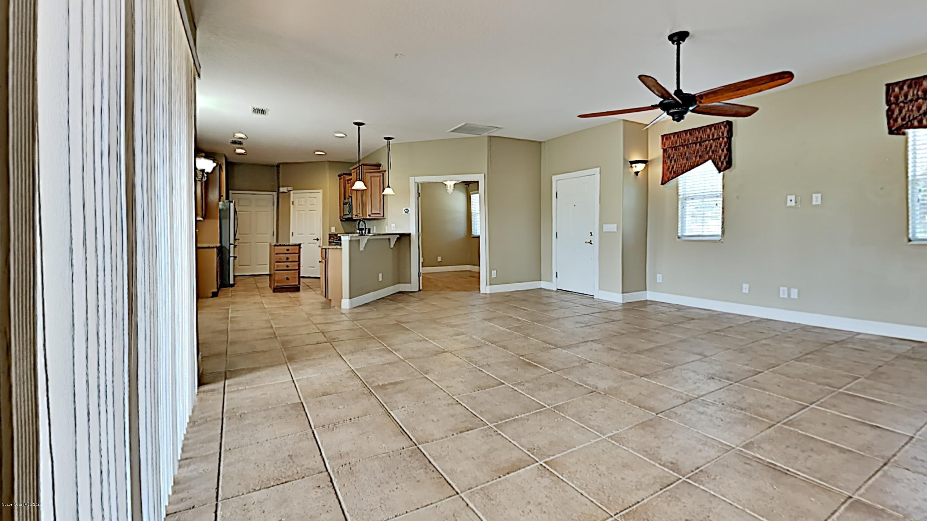 830 Riviera Drive Northeast Palm Bay, FL 32905 - Photo 4 of 21 a view of an entryway of a room