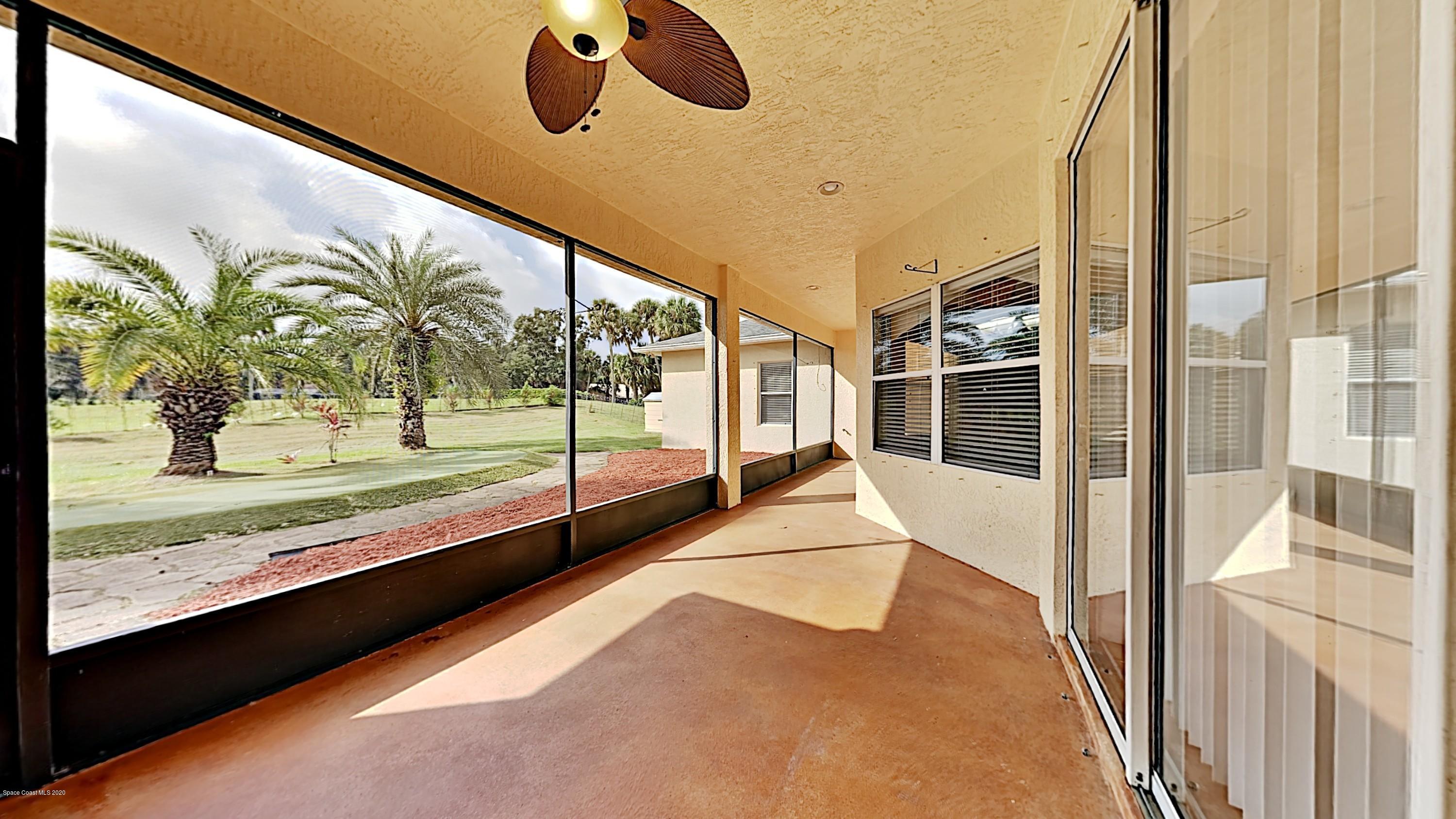 830 Riviera Drive Northeast Palm Bay, FL 32905 - Photo 8 of 21 a view of a porch