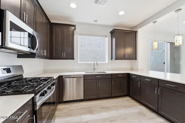 a view of a ceiling fan in a room