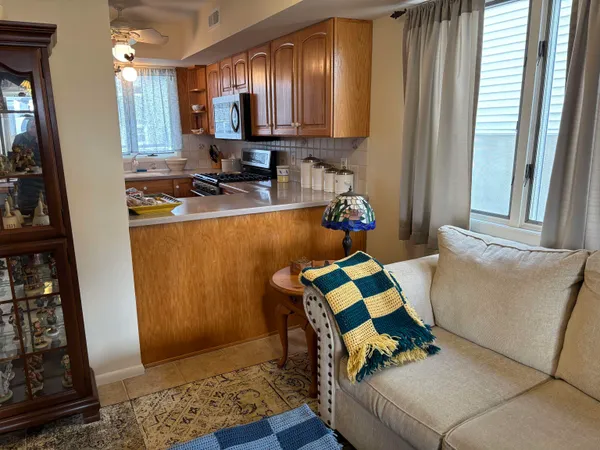 a living room with furniture and a window