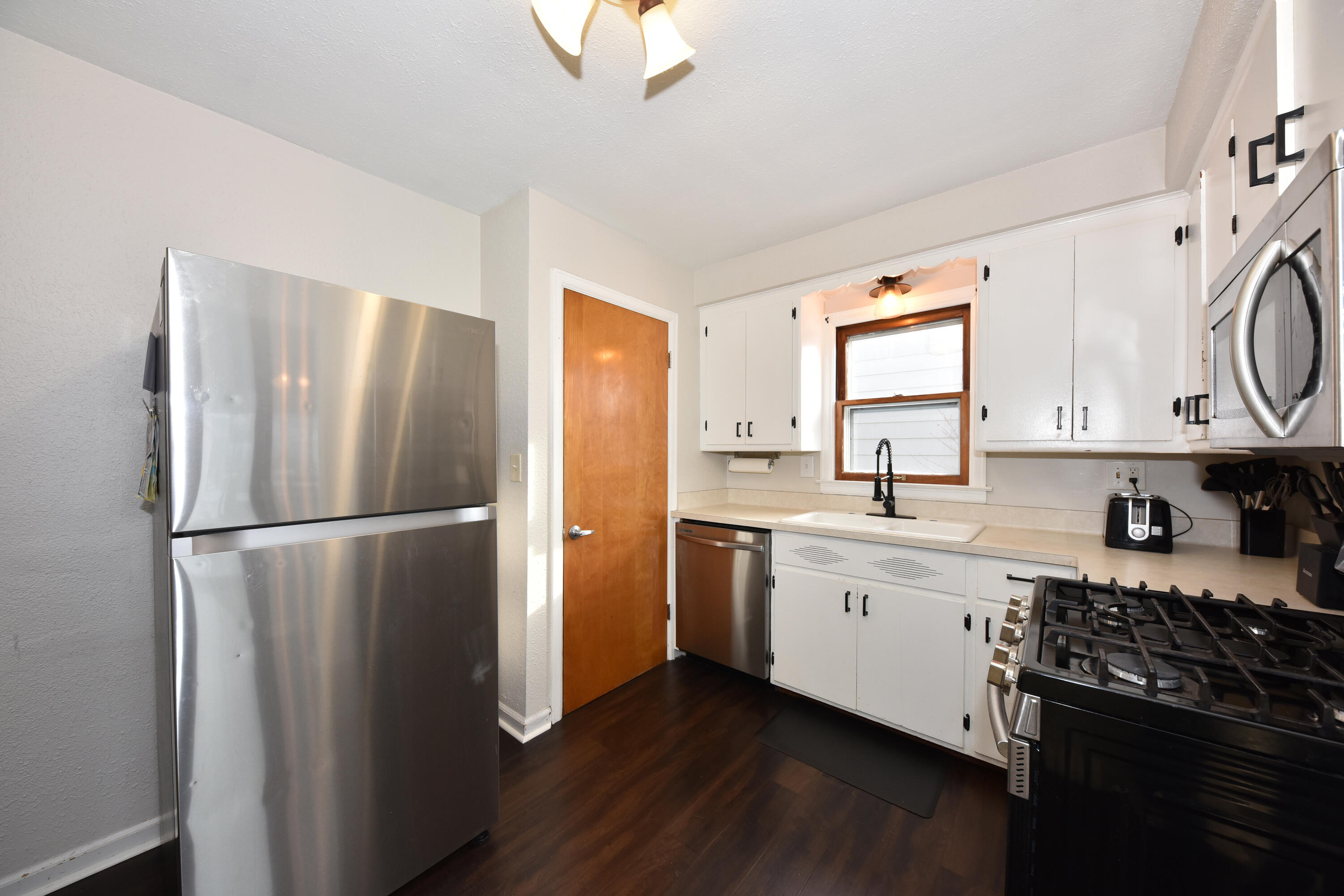 3341 North 88th Street Milwaukee, WI 53222 - Photo 7 of 37 Kitchen with door to basement