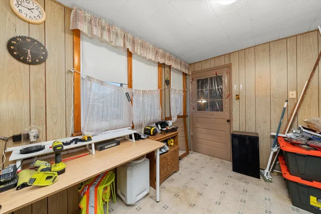 a bathroom with a sink a vanity and a mirror