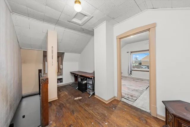 a bedroom with a bed and furniture