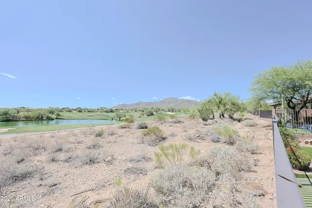 a view of lake with mountain