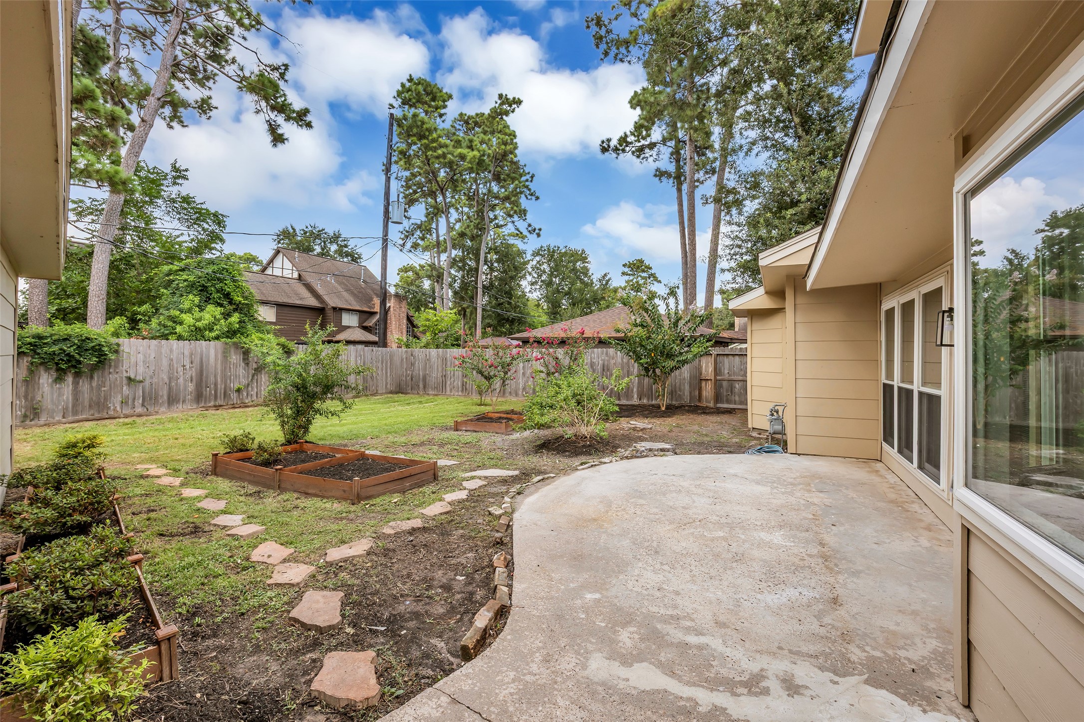 8310 Forest Ridge Road Spring, TX 77379 - Photo 22 of 25 Nice sized backyard for those enjoying gardens
