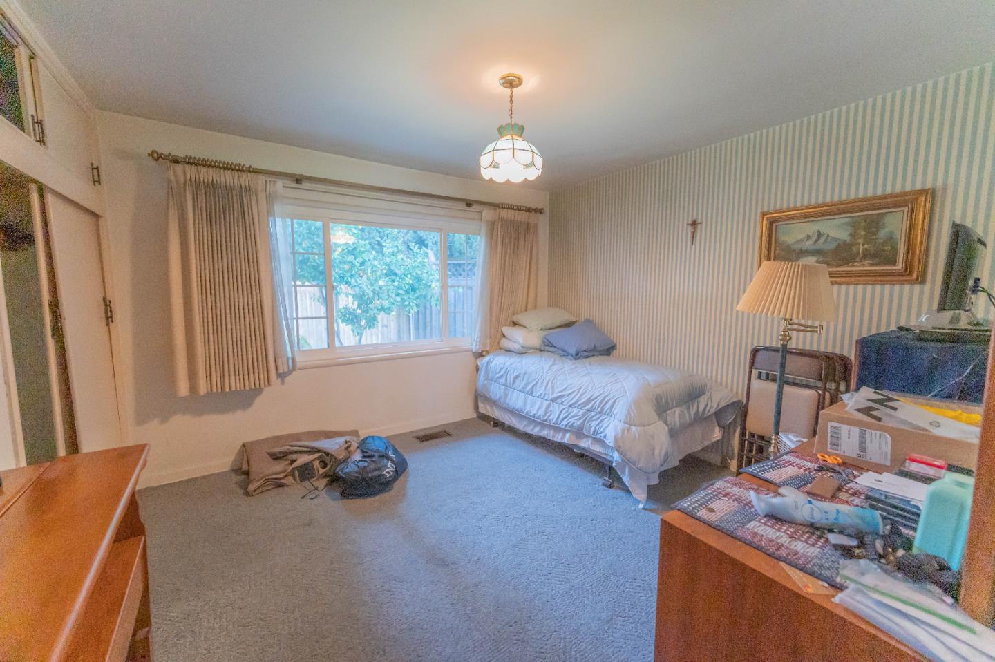 1184 Inverness Avenue Santa Clara, CA 95050 - Photo 14 of 29 a bedroom with furniture and a window