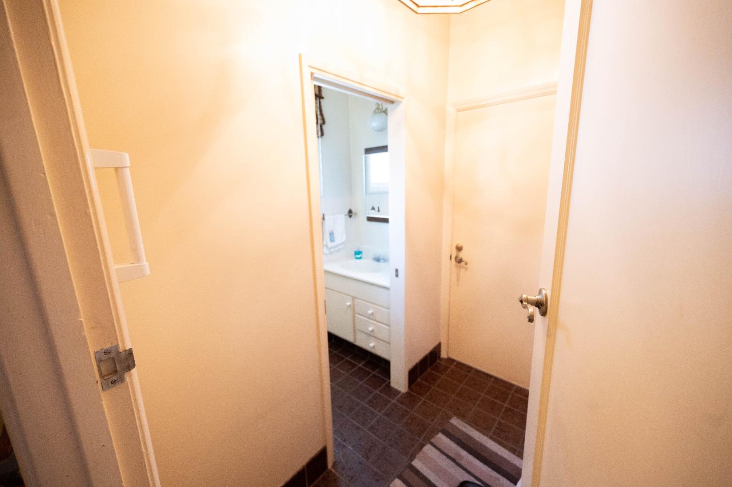 1184 Inverness Avenue Santa Clara, CA 95050 - Photo 17 of 29 a view of a hallway with wooden floor and closet