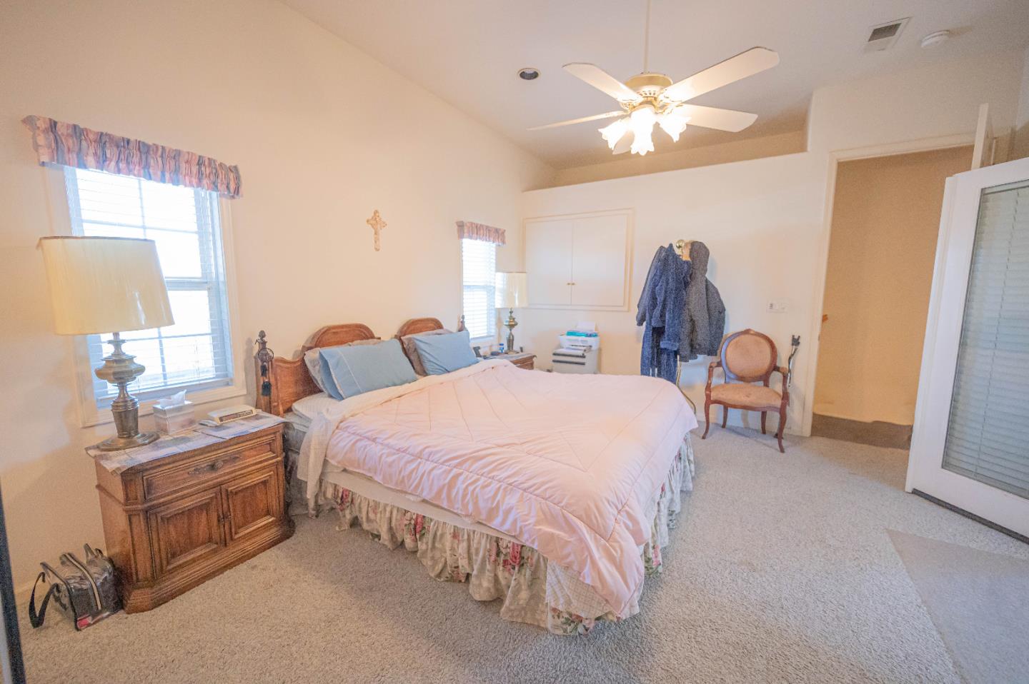 1184 Inverness Avenue Santa Clara, CA 95050 - Photo 19 of 29 a bed room with a bed and a chandelier