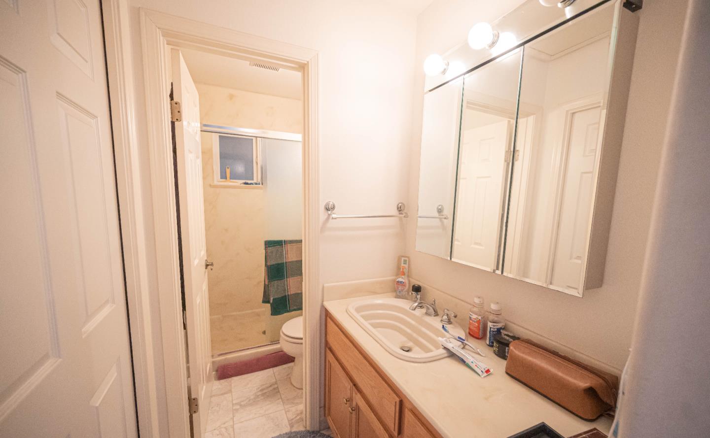 1184 Inverness Avenue Santa Clara, CA 95050 - Photo 20 of 29 a bathroom with a sink a toilet and shower