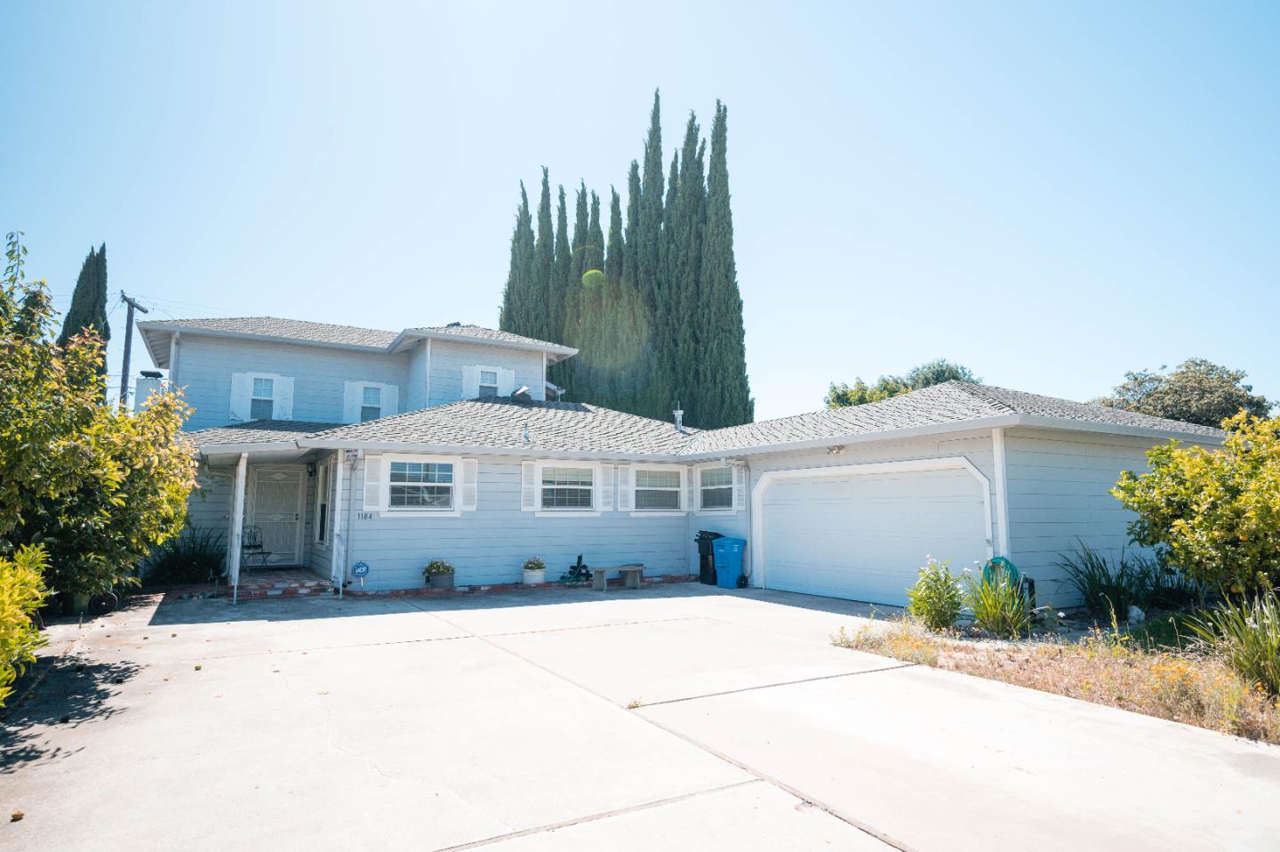 1184 Inverness Avenue Santa Clara, CA 95050 - Photo 2 of 29 a front view of a house with a garden