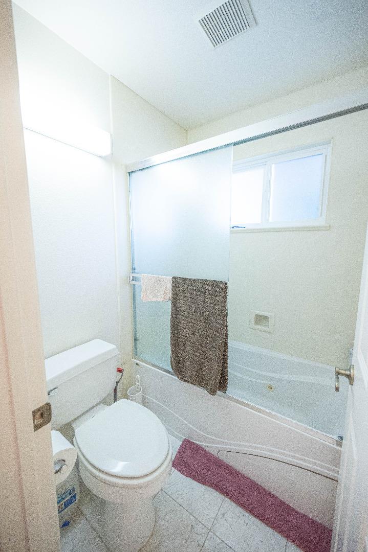 1184 Inverness Avenue Santa Clara, CA 95050 - Photo 21 of 29 a bathroom with a toilet and a shower