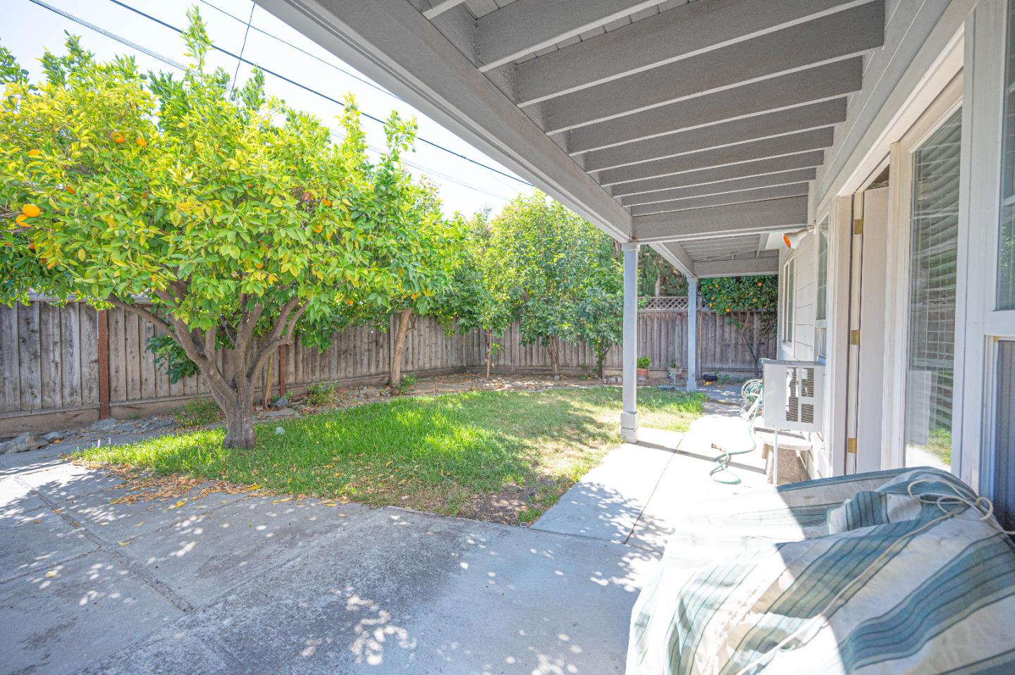 1184 Inverness Avenue Santa Clara, CA 95050 - Photo 26 of 29 a backyard of a house with yard and outdoor seating