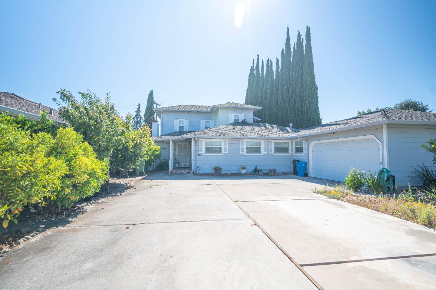 1184 Inverness Avenue Santa Clara, CA 95050 - Photo 3 of 29 a front view of a house with a garden and plants