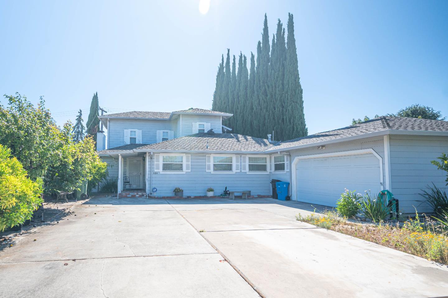 1184 Inverness Avenue Santa Clara, CA 95050 - Photo 4 of 29 a front view of a house with a garden and yard