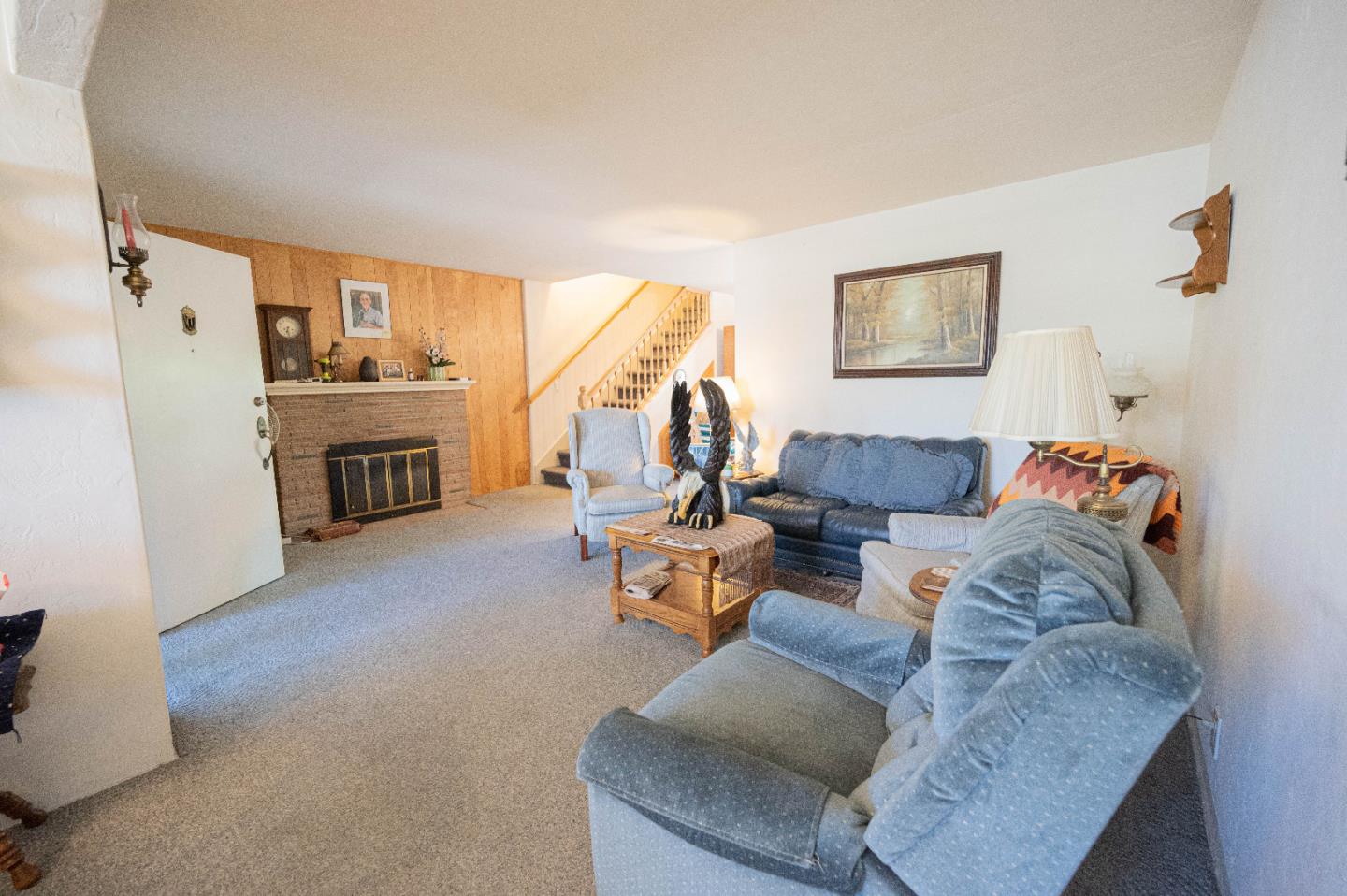 1184 Inverness Avenue Santa Clara, CA 95050 - Photo 9 of 29 a living room with furniture and a fireplace