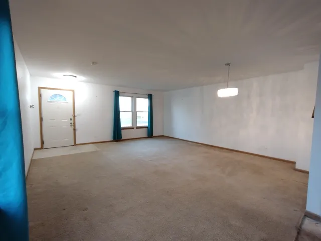 a view of empty room with window