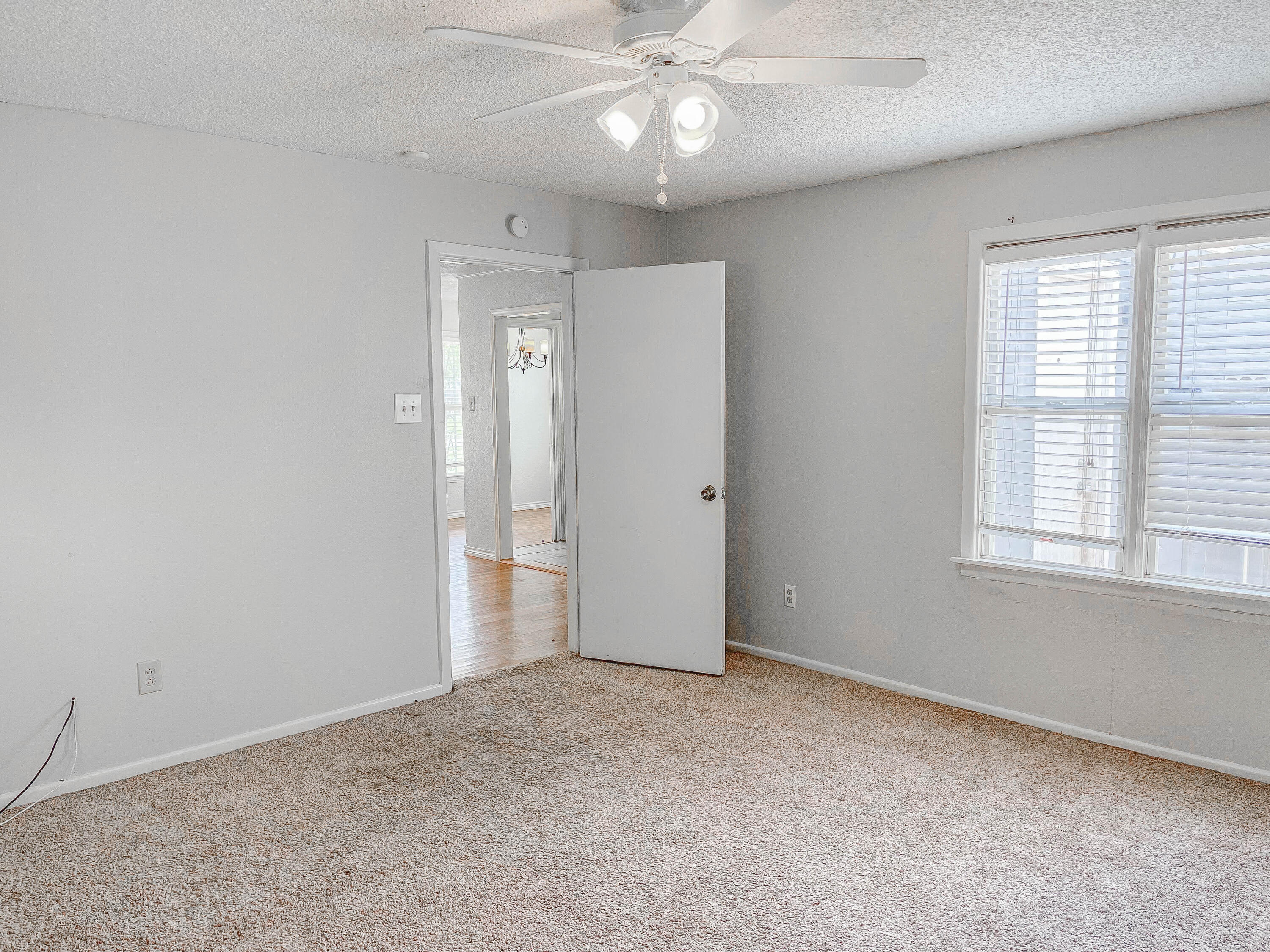 3418 26th Street Lubbock, TX 79410 - Photo 15 of 16 a view of an empty room with a window