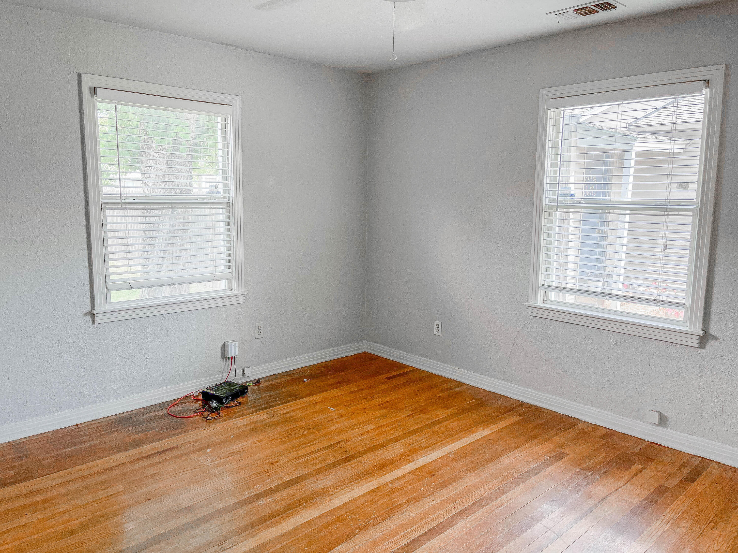 3418 26th Street Lubbock, TX 79410 - Photo 3 of 16 an empty room with a window