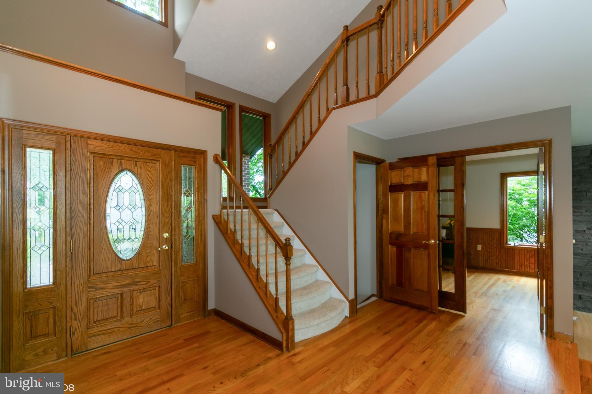 7110 Masters Road New Market, MD 21774 - Photo 3 of 29 A view of the foyer, stairs, & office, your space