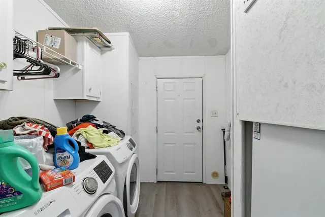 a view of livingroom with furniture and wooden floor